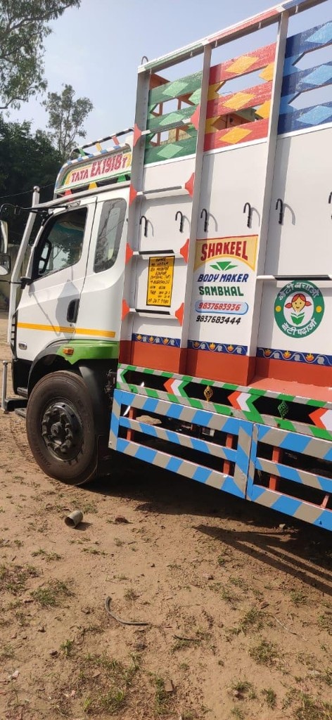 Close detail of open truck body paint and branding